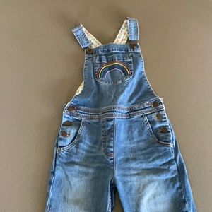 Adorable girls overalls with embroidered rainbow